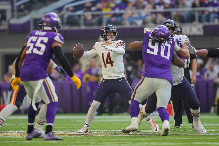 Jan 9, 2022; Chicago Bears quarterback Andy Dalton (14) passes against the Minnesota Vikings at U.S. Bank Stadium. Mandatory Credit: Brad Rempel-USA TODAY Sports